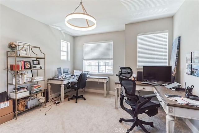 office area with baseboards and light colored carpet