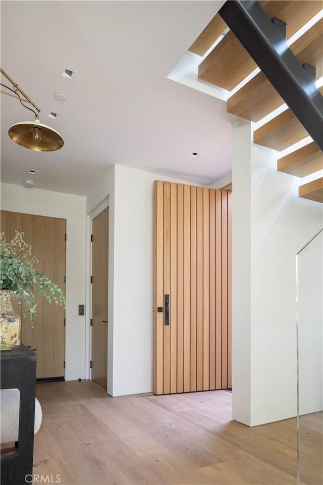 hallway featuring light wood-type flooring