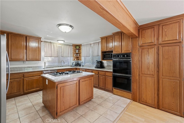 kitchen featuring backsplash, light tile patterned flooring, a kitchen island, and stainless steel appliances