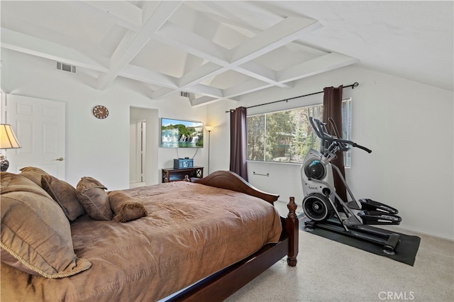 bedroom with carpet floors and beamed ceiling