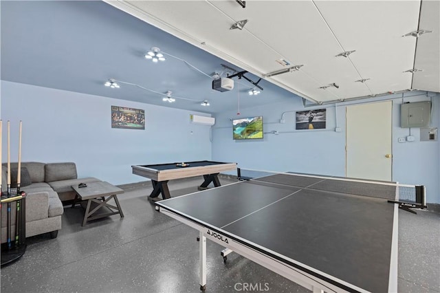 game room with speckled floor, pool table, and a wall unit AC