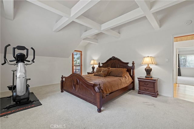 carpeted bedroom featuring beamed ceiling and multiple windows