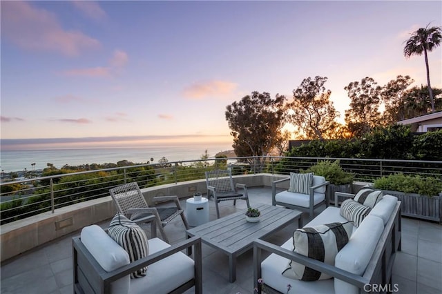 view of patio featuring an outdoor hangout area and a water view