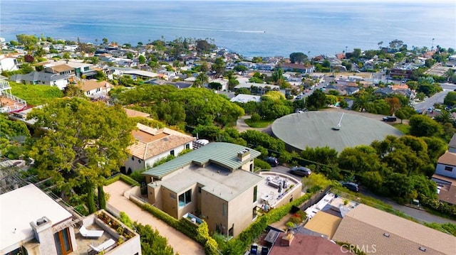 bird's eye view featuring a residential view and a water view