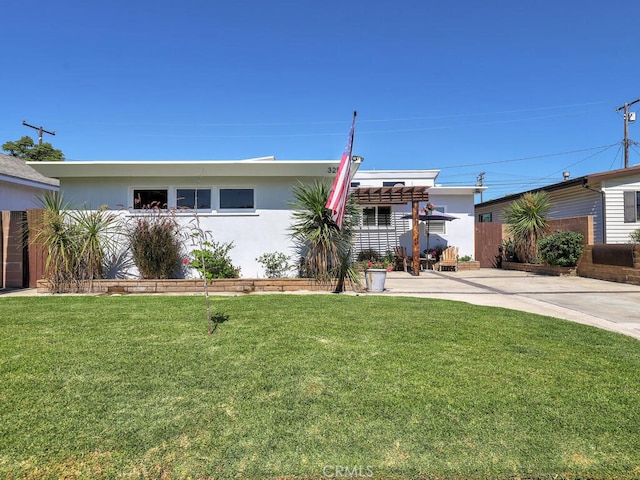 view of front of home with a front yard