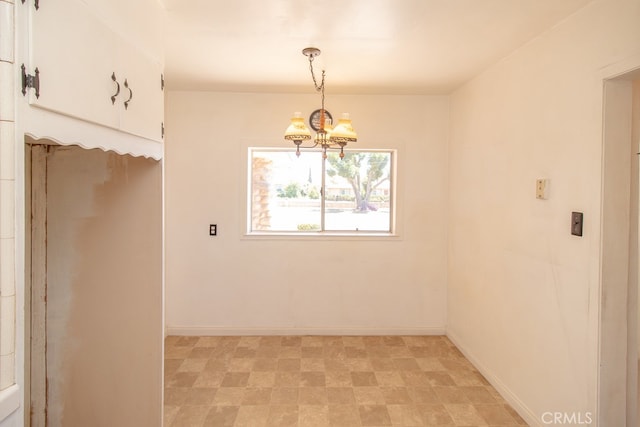 interior space with a chandelier