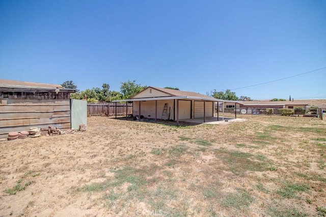view of yard with an outbuilding and a garage