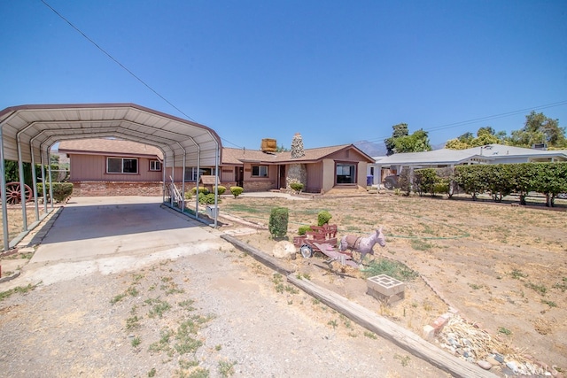 view of front facade featuring a carport