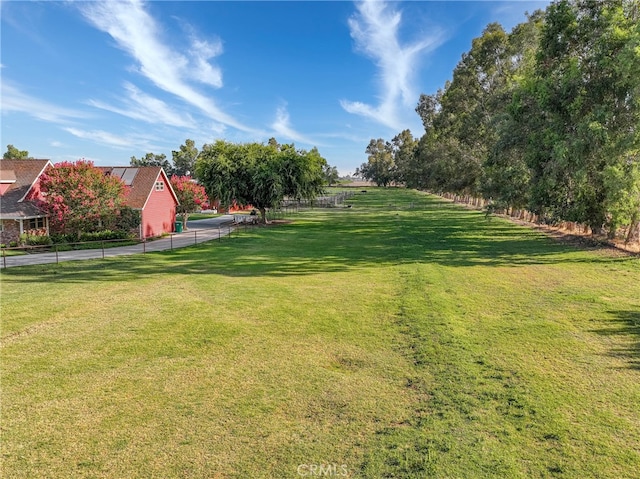 view of yard with a rural view