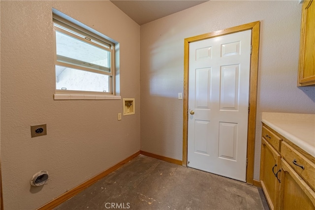 laundry room featuring hookup for a washing machine, cabinets, and electric dryer hookup