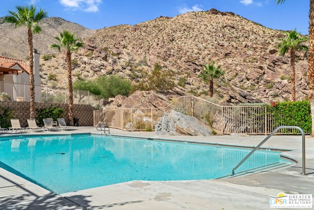 view of pool featuring a mountain view