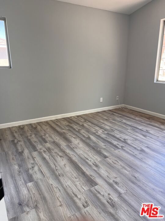 empty room featuring hardwood / wood-style flooring