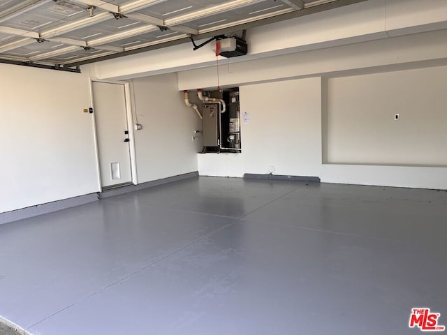 garage with heating unit and a garage door opener