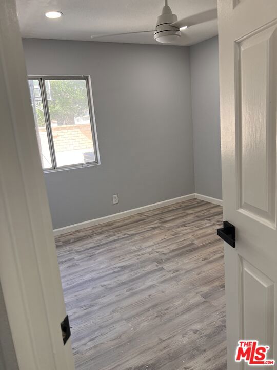 unfurnished room featuring light wood-type flooring