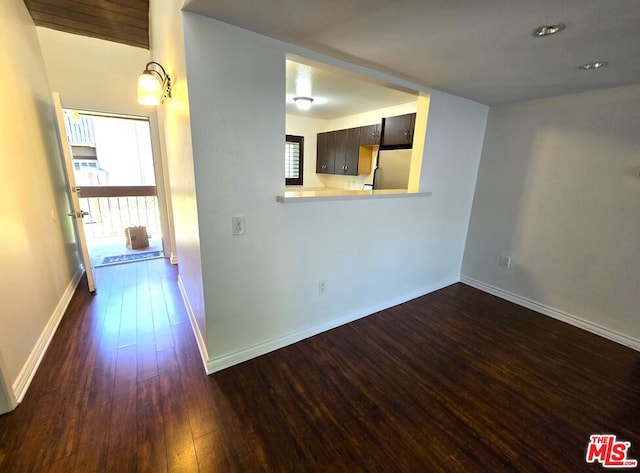 interior space with dark hardwood / wood-style flooring