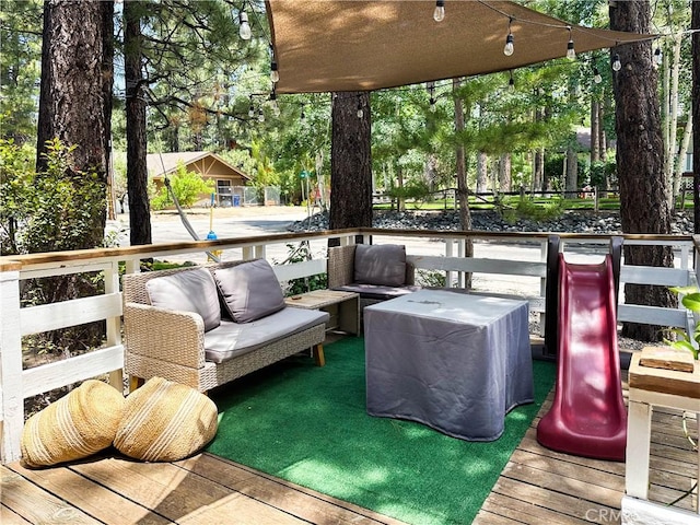 deck featuring an outdoor living space