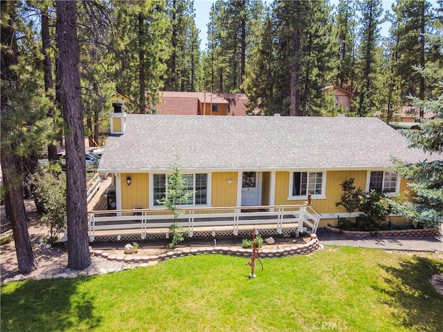 ranch-style home with a front yard