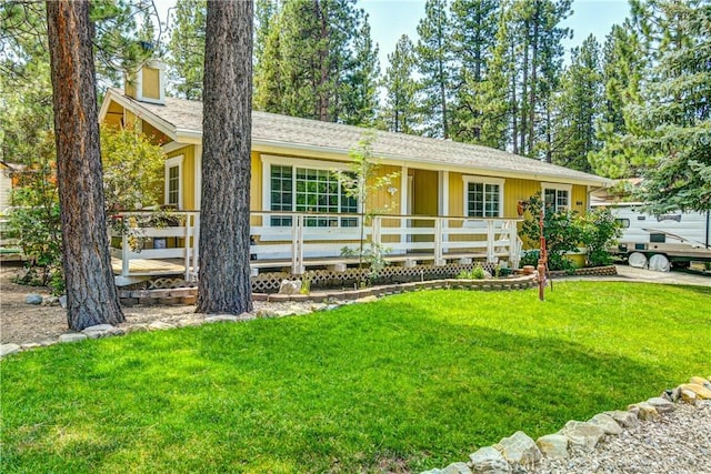 ranch-style house with a front lawn