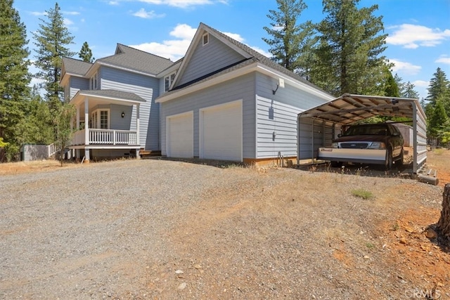 view of home's exterior featuring a porch and a carport