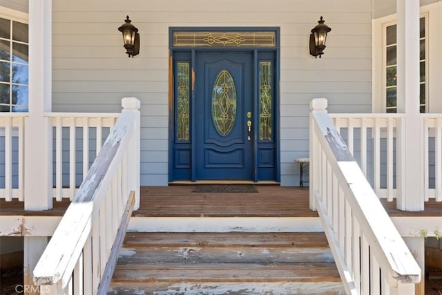 entrance to property with a porch