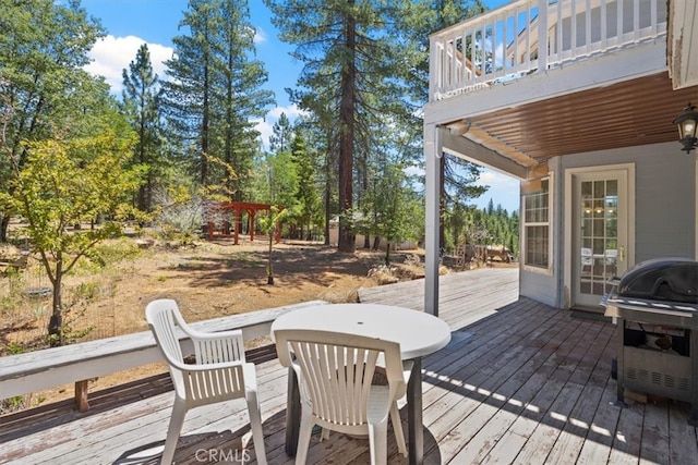 wooden terrace with grilling area