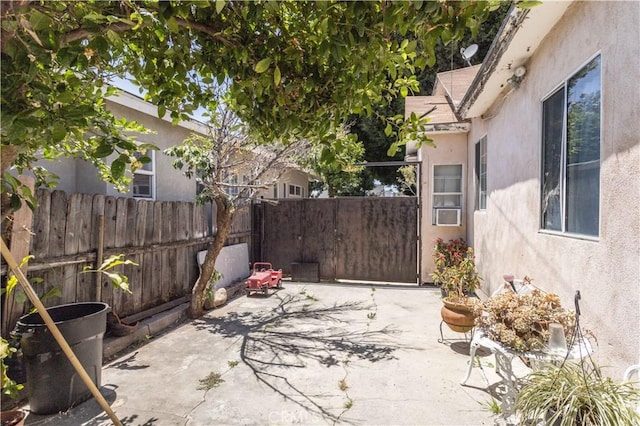 view of patio featuring fence