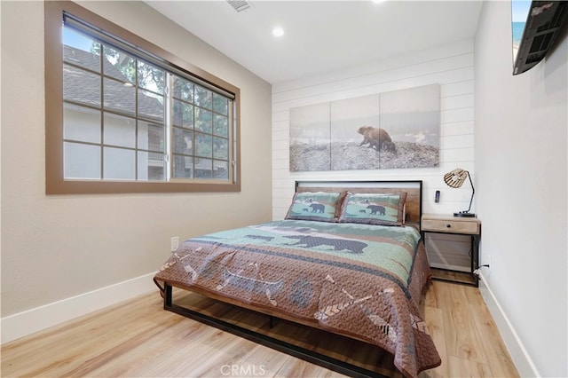 bedroom featuring wood-type flooring