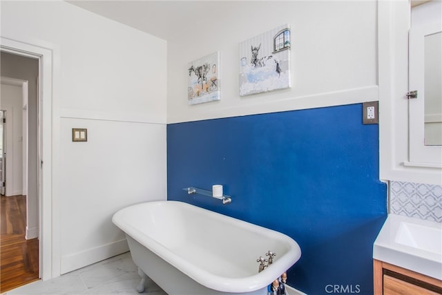 bathroom featuring vanity and a bathtub