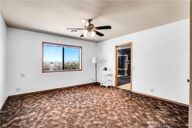 unfurnished room featuring carpet floors and ceiling fan