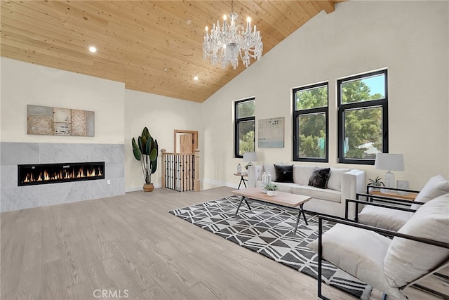 living room with high vaulted ceiling, wood-type flooring, a fireplace, beamed ceiling, and wood ceiling