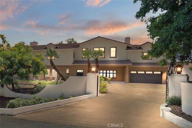 view of front of home with a garage