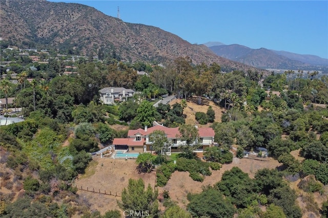 drone / aerial view featuring a mountain view