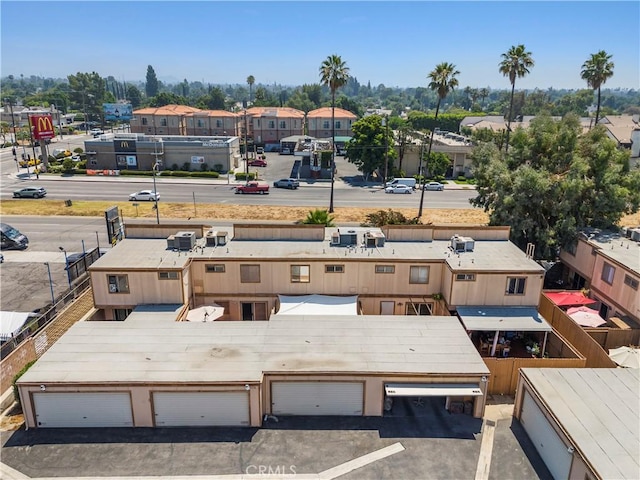 birds eye view of property with a residential view