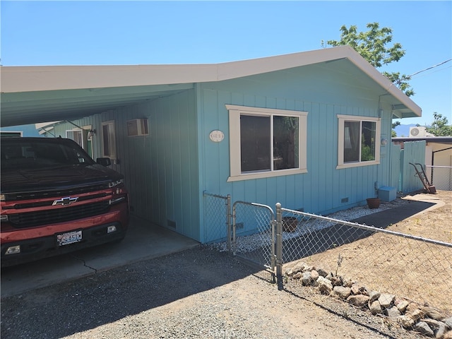 view of front of house with a carport