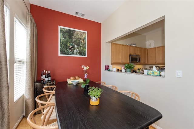 dining area featuring plenty of natural light