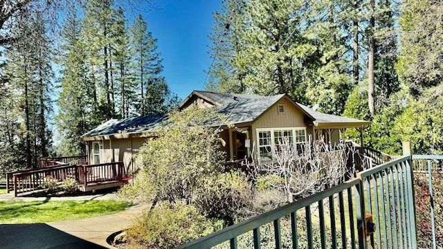 view of front facade featuring a wooden deck