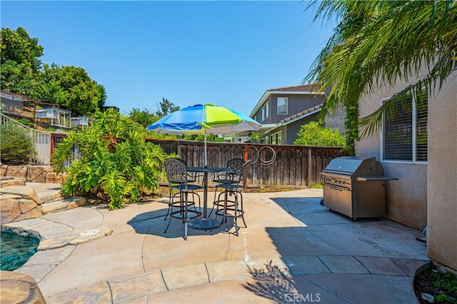 view of patio featuring grilling area