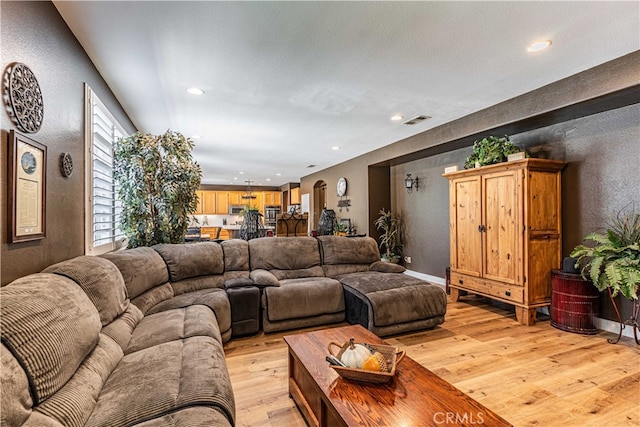 living room featuring light wood-type flooring