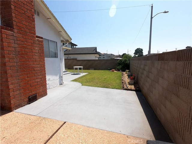 view of yard with a patio