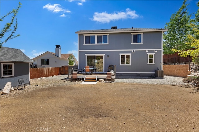 rear view of house featuring a patio