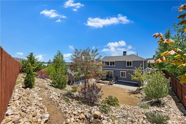 back of property with a patio area