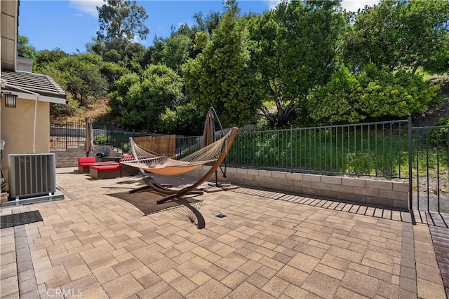 view of patio with central AC unit