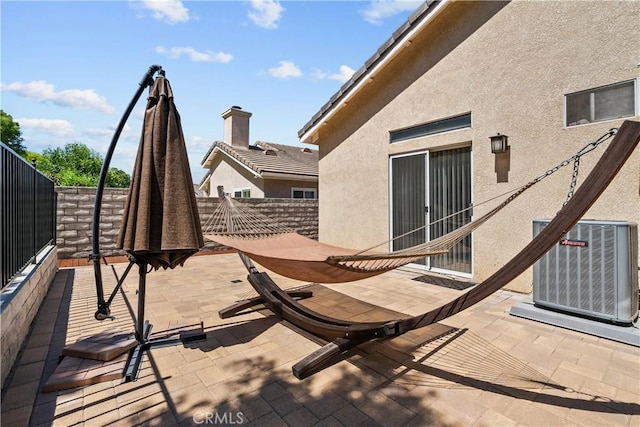 view of patio featuring central AC unit