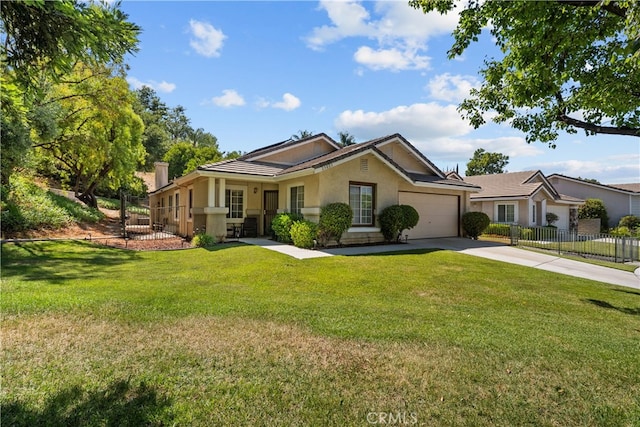 view of front of house with a garage and a front lawn