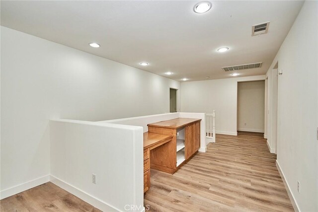 hallway featuring light hardwood / wood-style floors