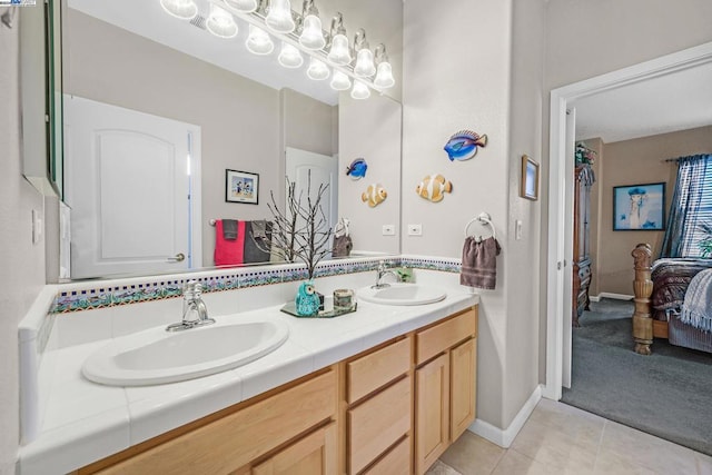 bathroom with vanity and tile patterned floors