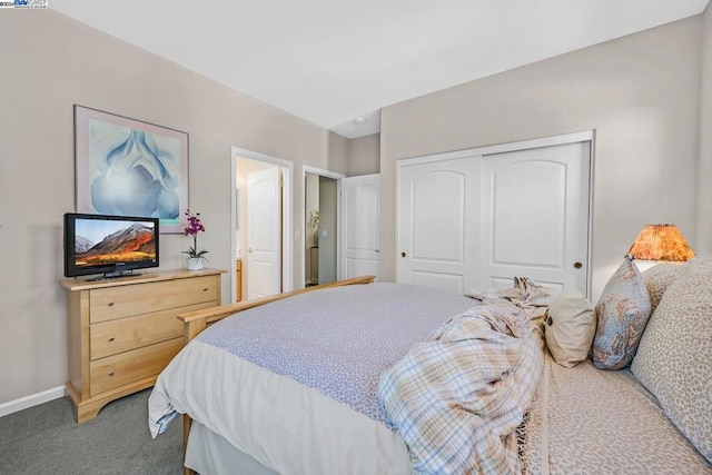 carpeted bedroom featuring a closet