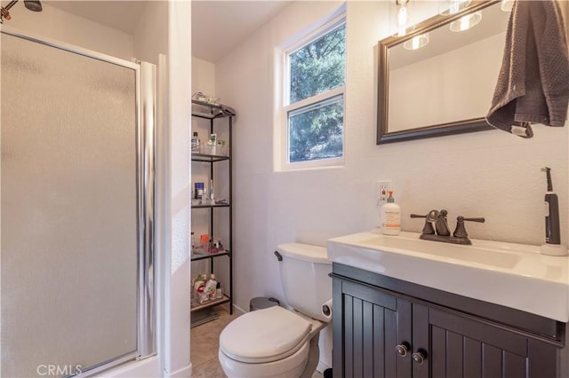 full bath with toilet, a shower stall, and vanity