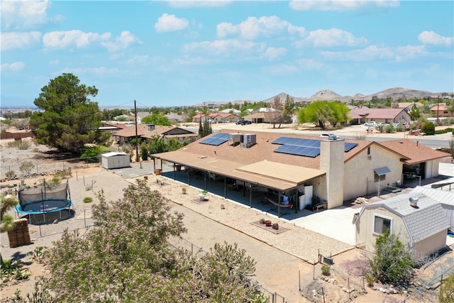 birds eye view of property featuring a residential view and a mountain view