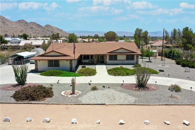 ranch-style house with a mountain view